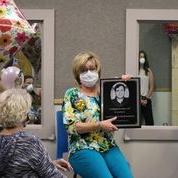 Person holding plaque